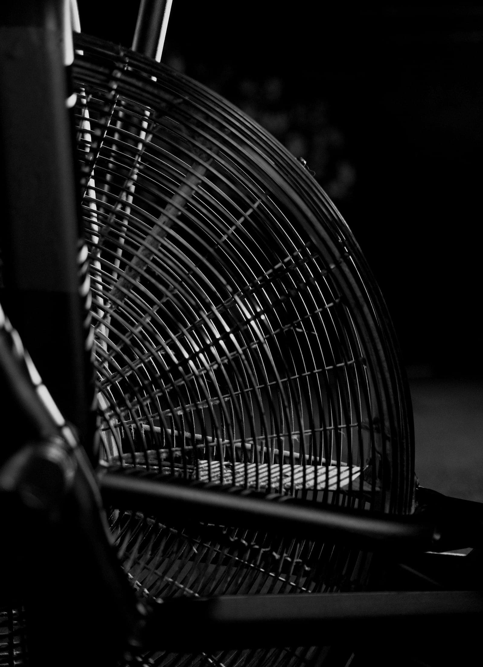 The fan wheel of an air bike, close up.
